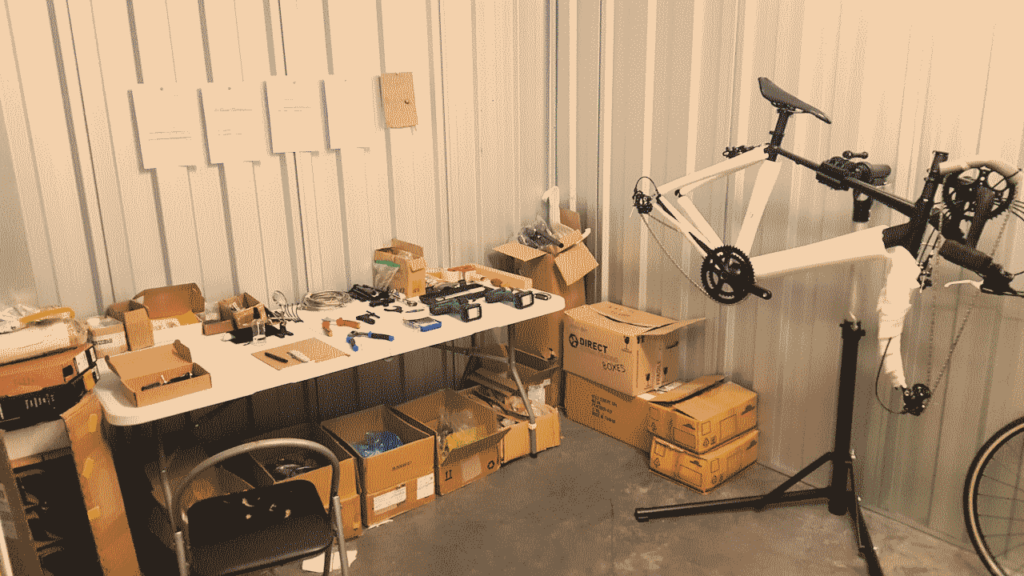Leg and arm pedal bicycle being assembled in UK