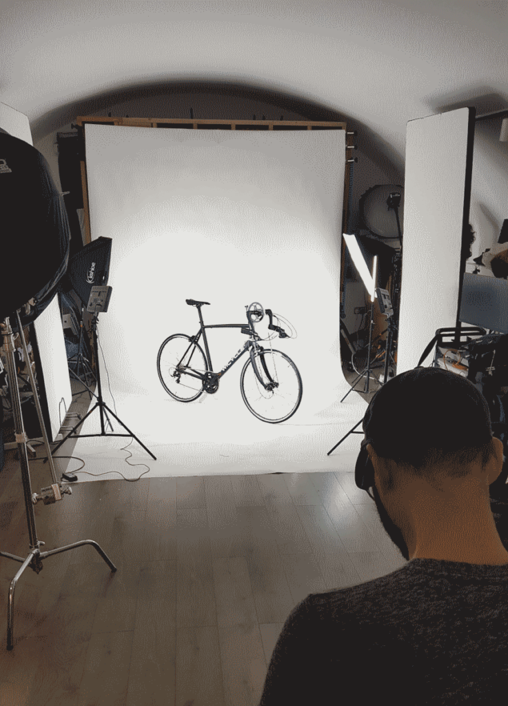 Twicycle v2, 2WD bike for arms and legs, being photographed in a studio