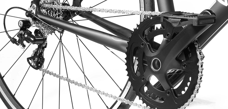 Full body bike leg drive system showing crankset and derailleur