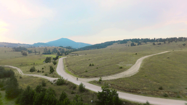 Scenic view of twicycle full body bicycle hand cycling in the mountanous region